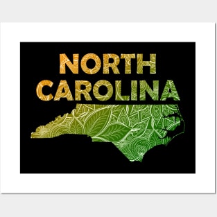 Colorful mandala art map of North Carolina with text in green and orange Posters and Art